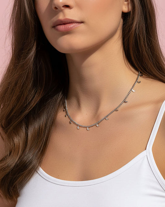 Model wearing a stainless steel Silver Crescent Moon Necklace