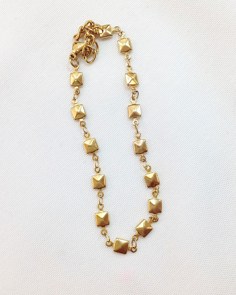 A waterproof Square Chain Anklet in gold