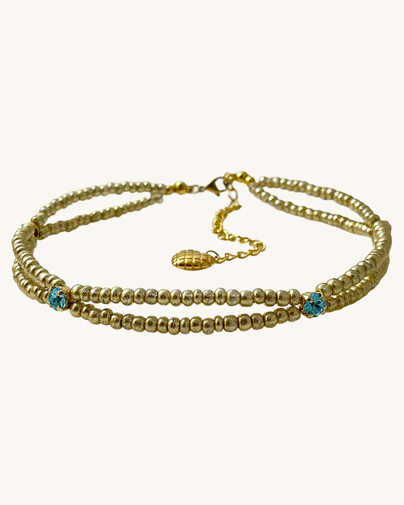 gold bead choker necklace with light turquoise crystals
