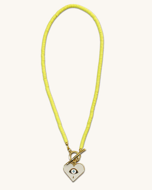Toggle necklace with yellow heishi beads and a heart pendant