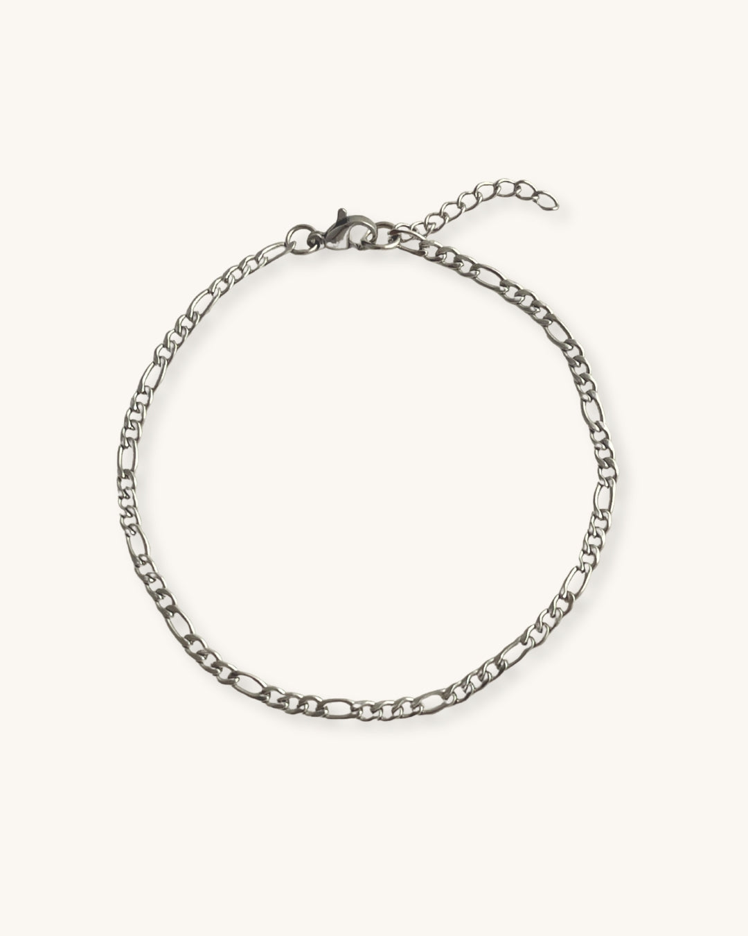 A delicate figaro chain bracelet in silver
