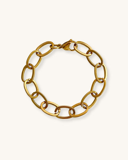 Chunky oval links chain bracelet in gold on a white background
