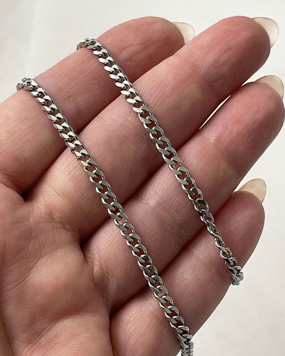 A silver curb long chain necklace 3 mm wide perfect for layering