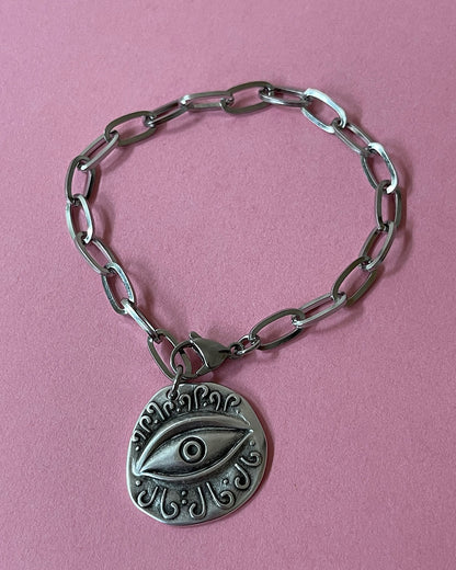 Evil eye charm bracelet with paperclip chain and a round eye charm in silver