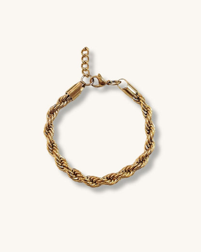 Waterproof gold rope chain bracelet on a neutral background