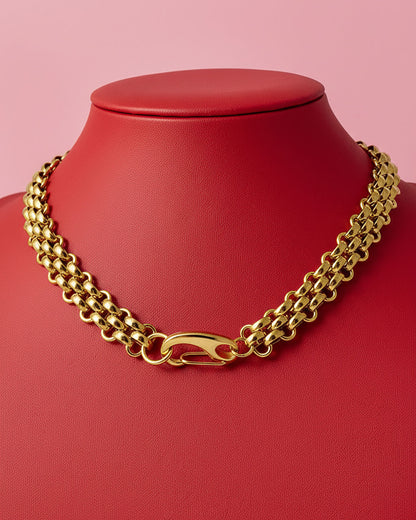 Gold chainmail necklace with a large lobster clasp