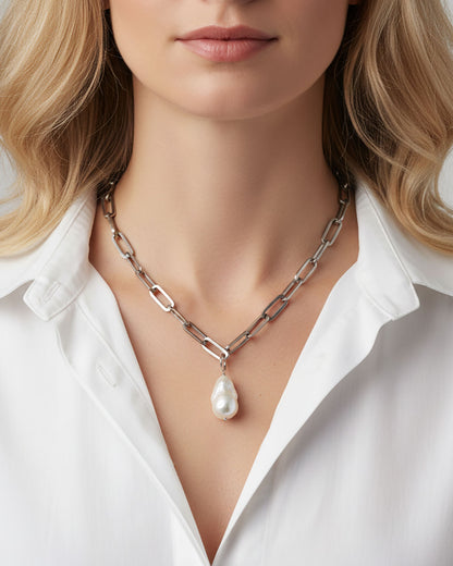 Model wearing a baroque pearl paperclip chain necklace in silver