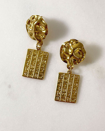 Gold dangle earrings Egyptian style wth hieroglyphic tags