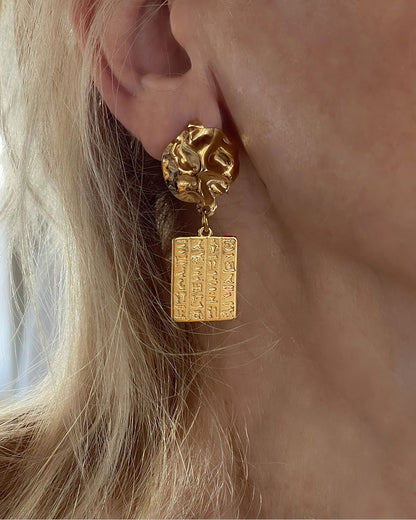 Gold dangle earrings Egyptian style wth hieroglyphic tags