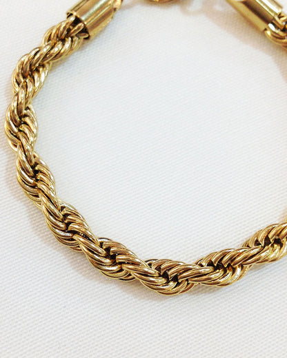 Close-up look of a gold rope chain bracelet