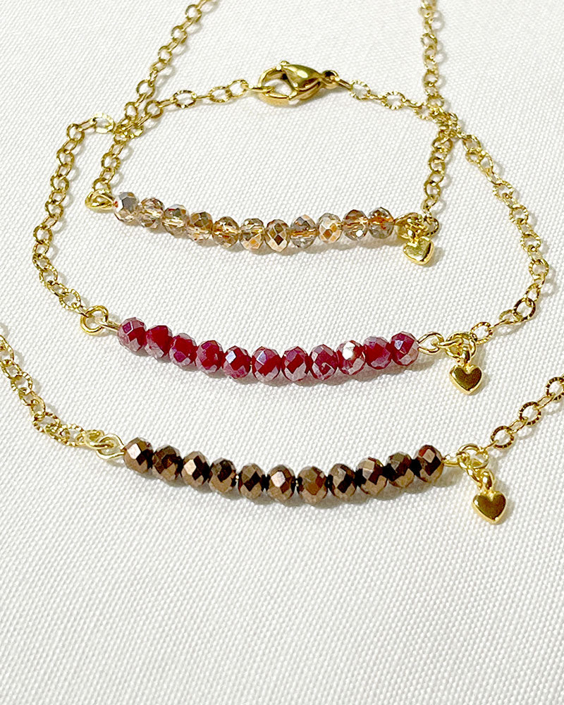 EMILIA BAR BRACELET IN RED IRIDESCENT