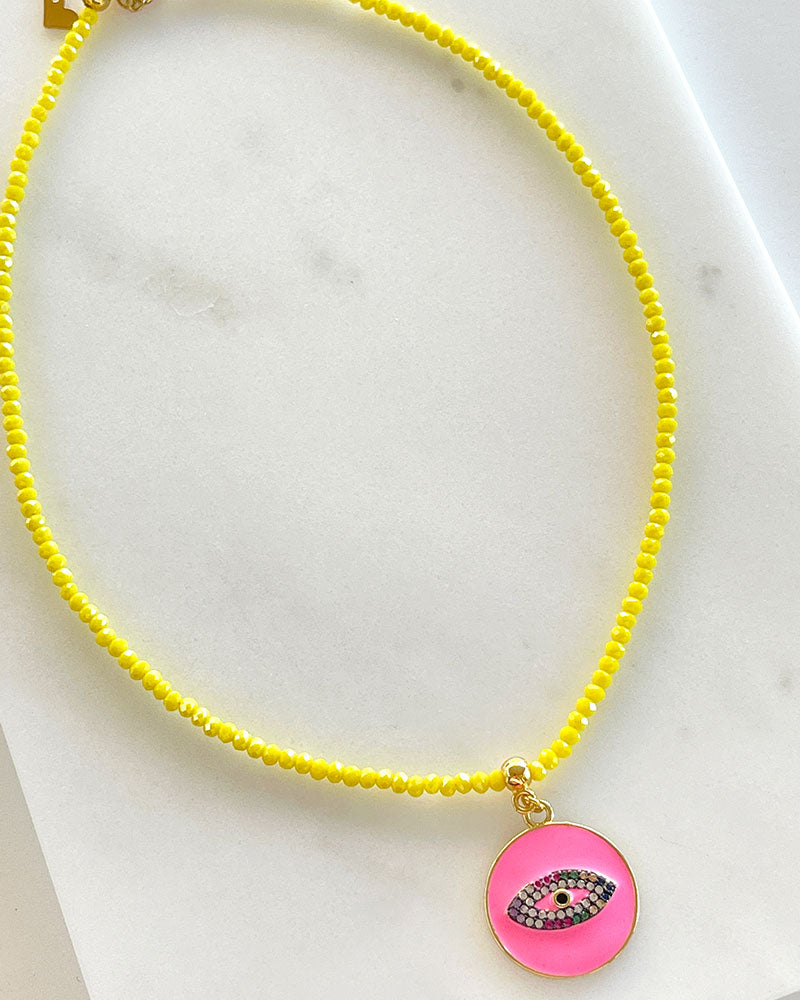 PINK EYE NECKLACE IN YELLOW