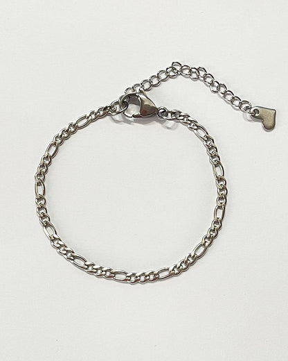 A delicate figaro chain bracelet in silver