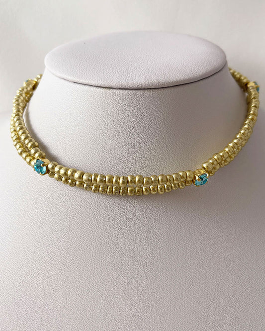 gold bead choker necklace with light turquoise crystals