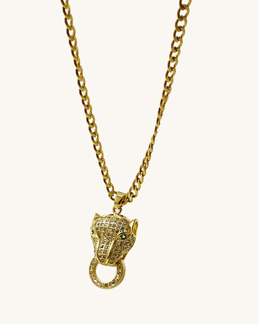 panther pendant with gold curb chain necklace