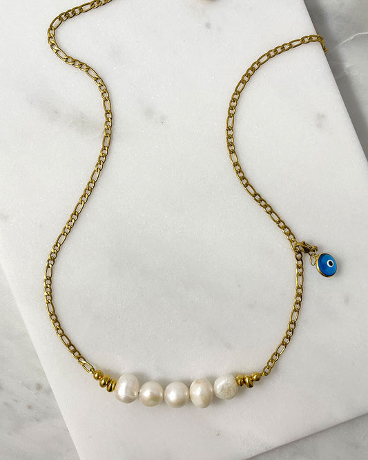 pearl bar necklace in gold with a blue evil eye murano charm