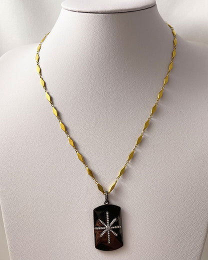 A trendy Star Tag Necklace with a touch of sparkle