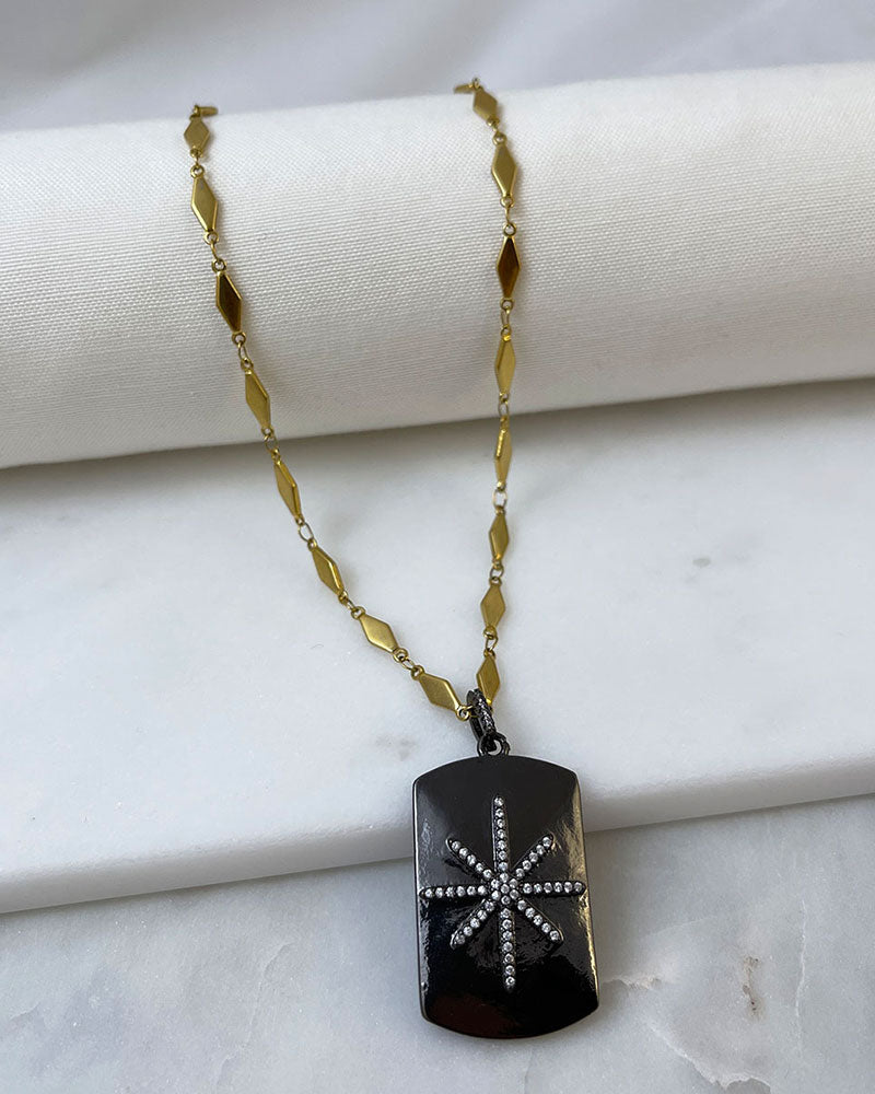 A trendy Star Tag Necklace with a touch of sparkle