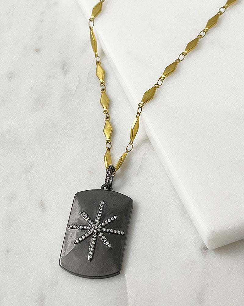 A trendy Star Tag Necklace with a touch of sparkle