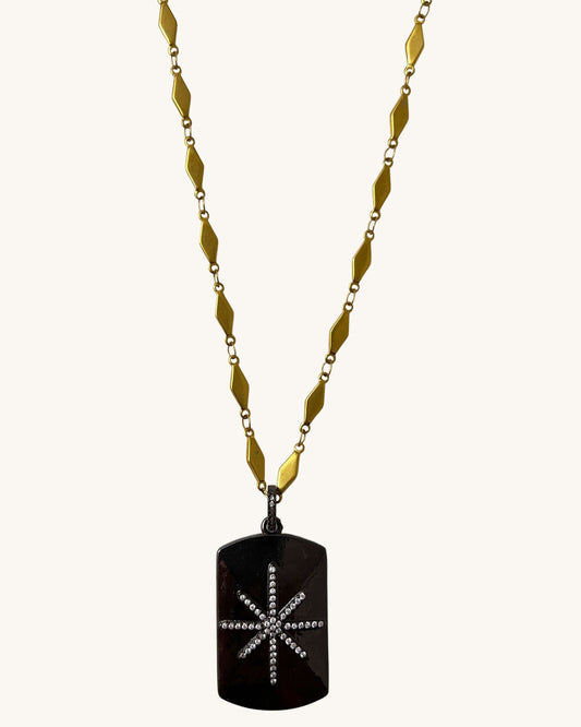 A trendy Star Tag Necklace with a touch of sparkle